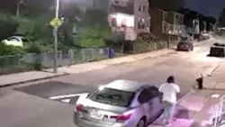 WATCH: Video shows man throwing rock through car’s rear windshield in Boston